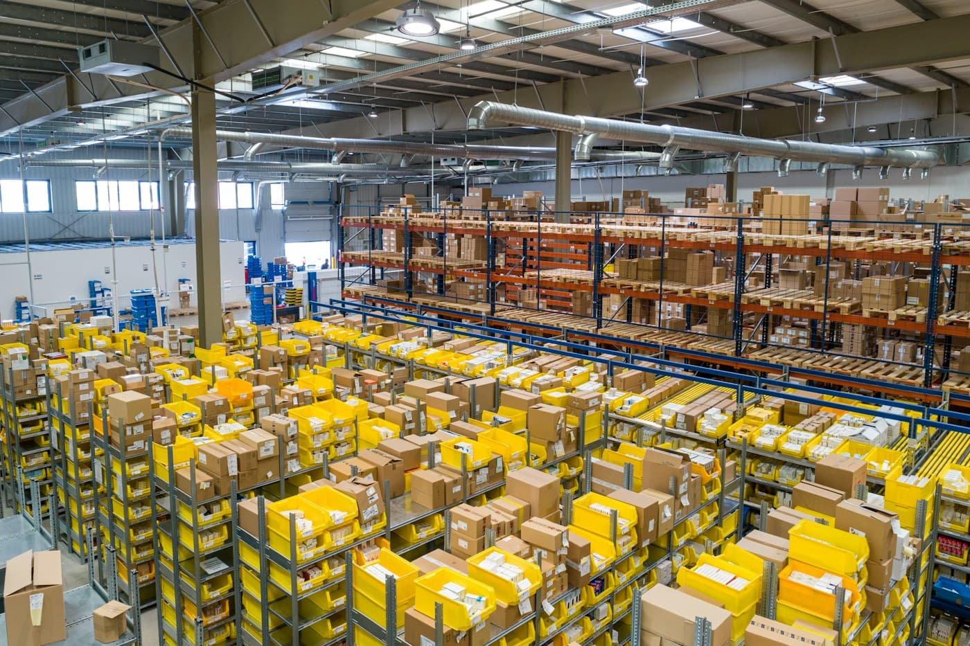 Packed goods and organized shelving in a commercial distribution warehouse